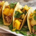 easy chicken tacos with pineapple mango salsa cover