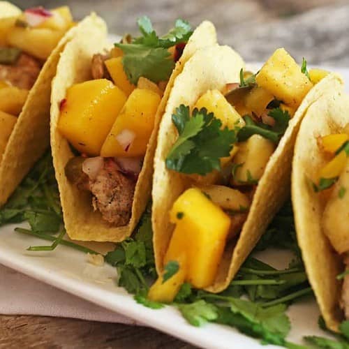 easy chicken tacos with pineapple mango salsa cover