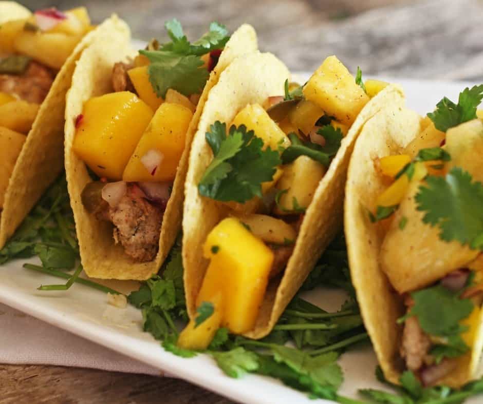 easy chicken tacos with pineapple mango salsa cover