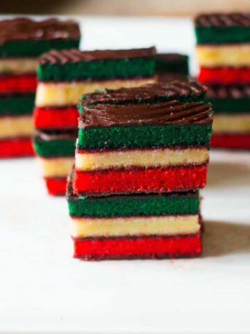 Italian rainbow cookies are three level cookies with apricot and raspberry jam between each layer