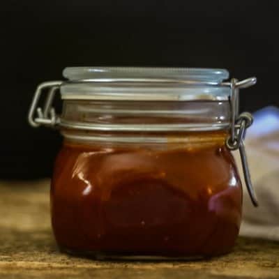 A tasty homemade BBQ sauce in a mason jar makes an awesome hostess gift!