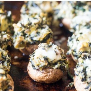 Vegetarian stuffed mushrooms with spinach, artichoke and cheese to make amazing stuffed mushrooms