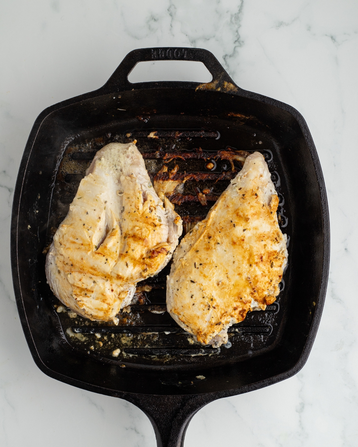 Chicken on a grill pan to make grilled gyros