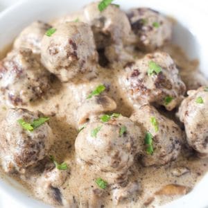 Swedish Meatballs in gravy made in the Instant Pot in a white bowl.
