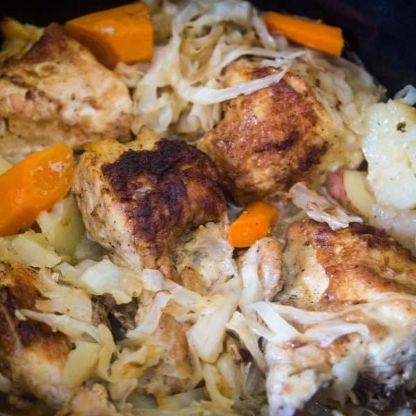 Cider braised chicken and cabbage ready to be served.