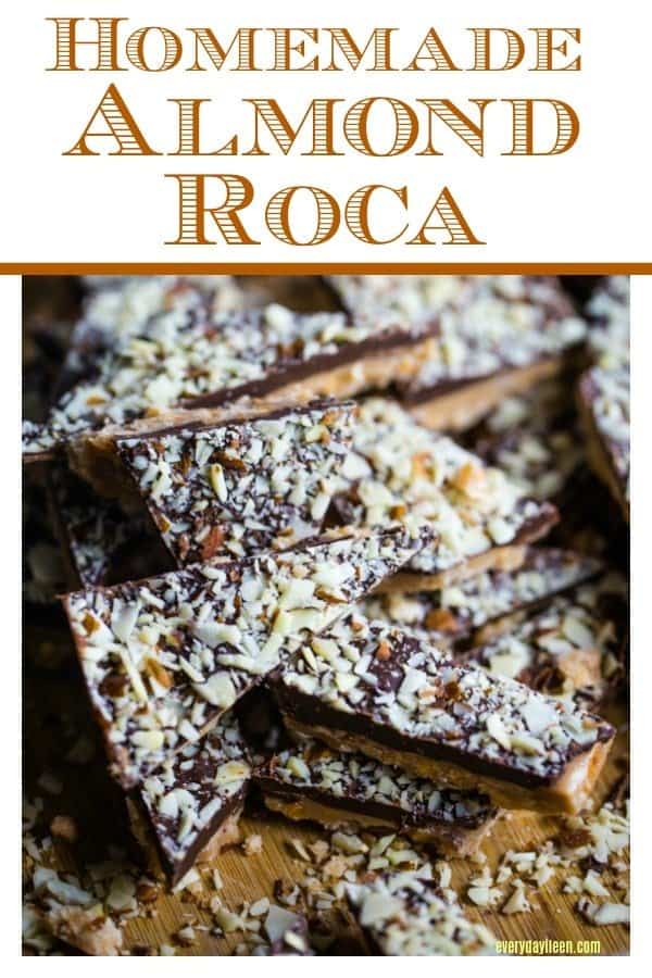 A few pieces of mouthwatering homemade almond roca piled on a cutting board