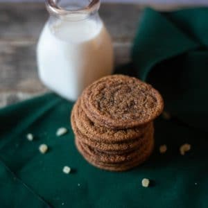 Gingersnap cookies with a jug of milk ready to be served for some Holiday treats!