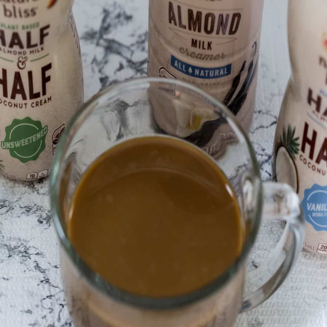 Coffee in a clear mug with Coffee mate® natural bliss® Plant Based Half & Half Unsweetened Coffee mate® natural bliss® Plant Based Half & Half Vanilla 16oz
