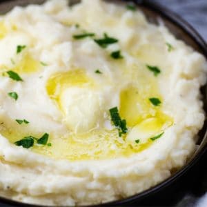 Warm Creamy Mashed Potatoes with melting butter that were made in the Instant Pot!