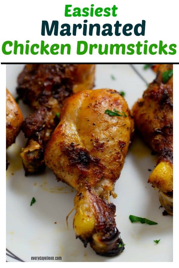 easy marinated chicken drumsticks that have been baked and served on a white platter