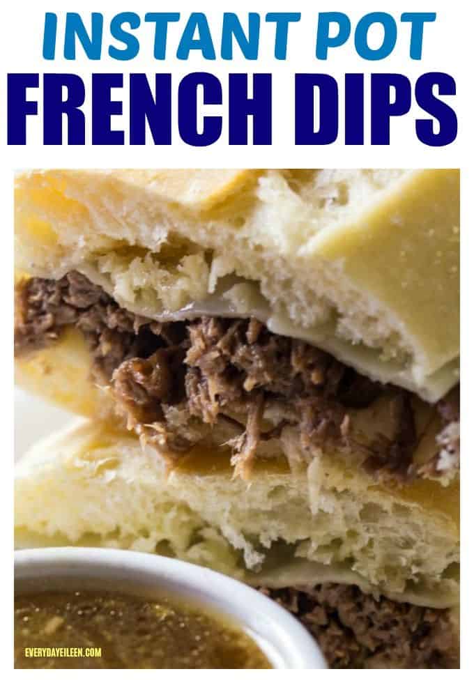 FRENCH DIP sandwiches with an au jus on a white plate.