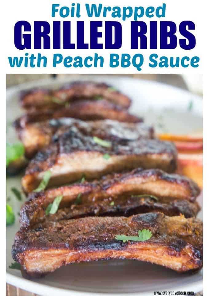 delicious ribs on a white platter with peach bbq sauce