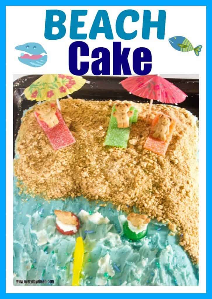 A festive cake decorated with a beach then with graham cracker sand, teddy graham people on candy blankets