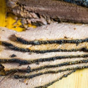 coffee rub brisket that has been sliced and ready to serve