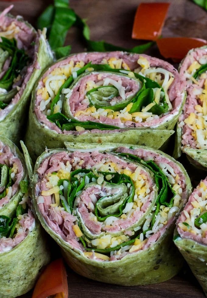 Roast beef and cheese tortilla rollups on a tray