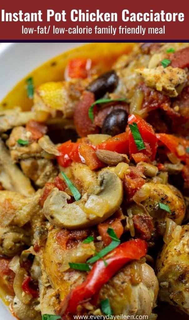 Chicken cacciatore on a white plate with sauteed mushrooms and peppers