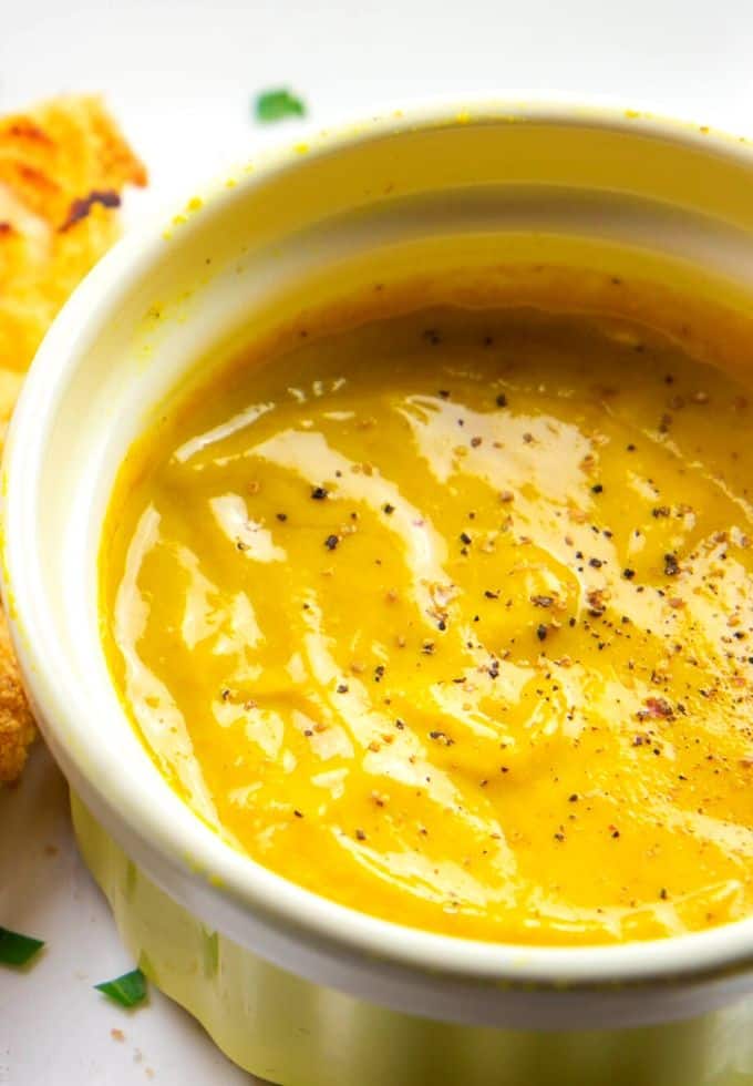 Delicious mustard dipping sauce in a white bowl.