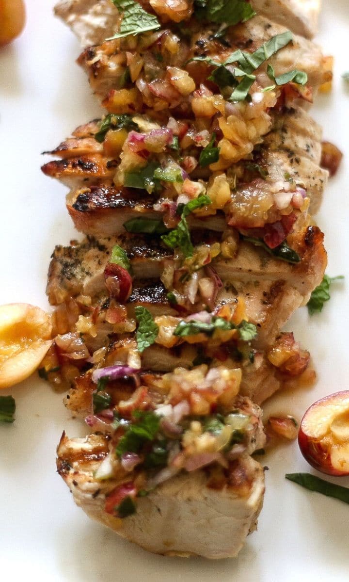 Grilled chicken topped with a fresh cherry salsa.