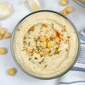 an overhead view of chickpea hummus in a bowl