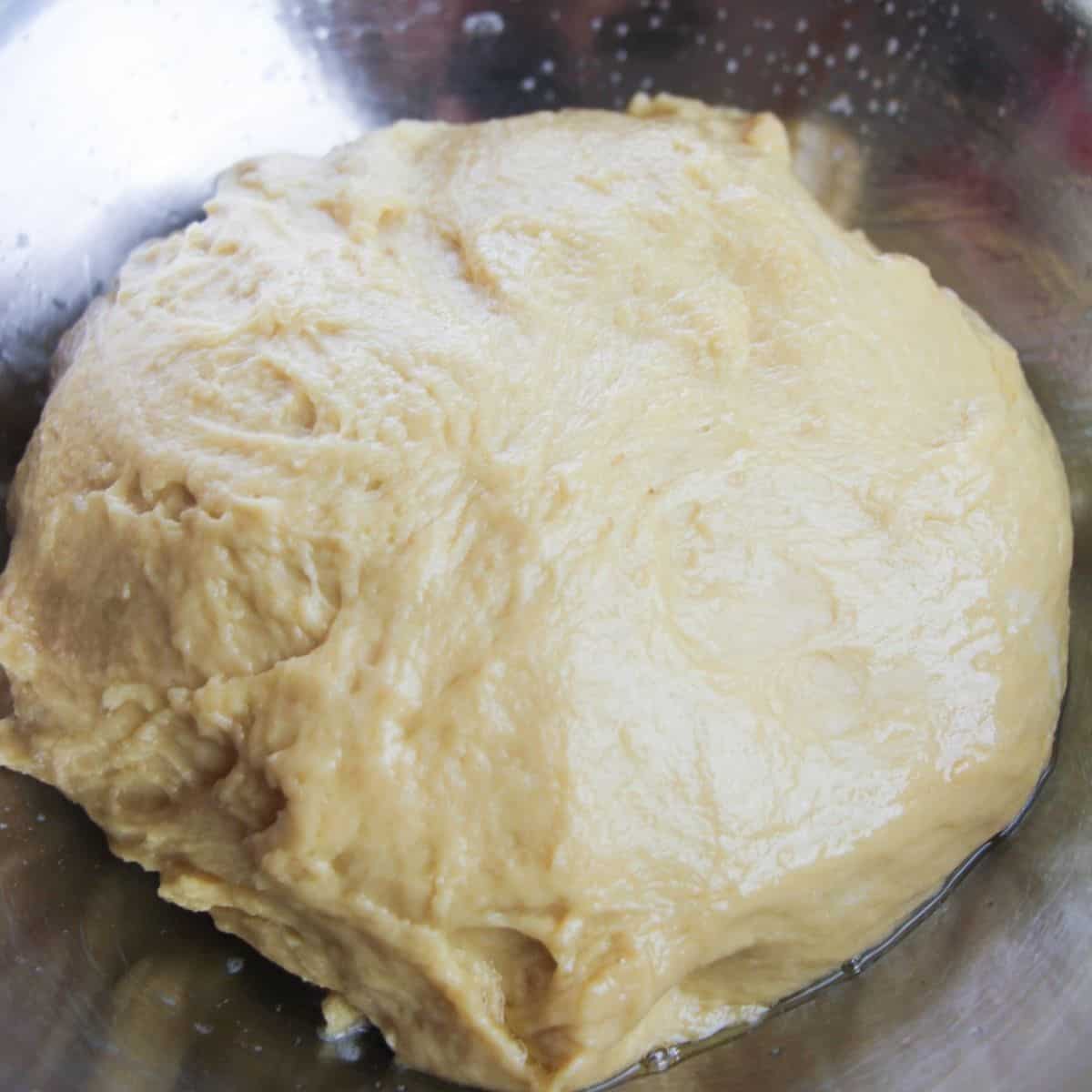 Knead the dough to make sweet rolls