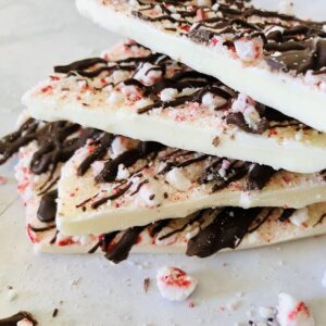 White chocolate drizzled with milk chocolate and crushed peppermint candies