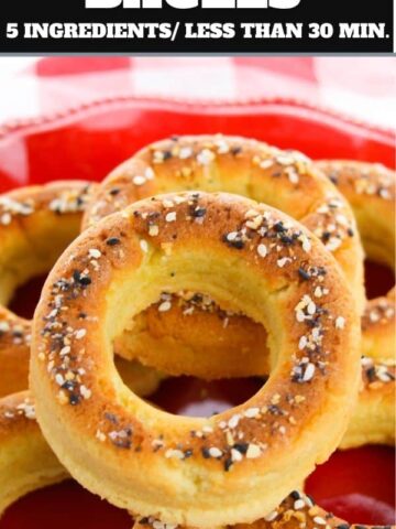 keto bagels topped with everything seasoning on a red plate