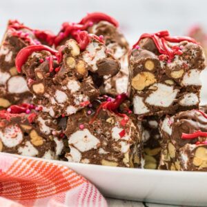 Squares of chocolate fudge on a platter.