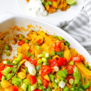 A casserole with beans, beef, and fritos