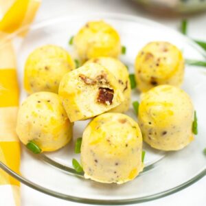 A glass plate with egg bites on it.