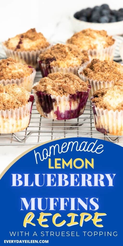 Blueberry muffins with a streusel topping on a wire rack.