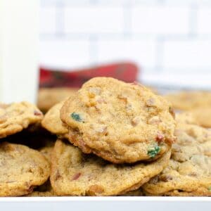 Homemade crispy cookies with candied green and red cherries.