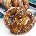 A hard pretzel with everything bagel seasoning on it.