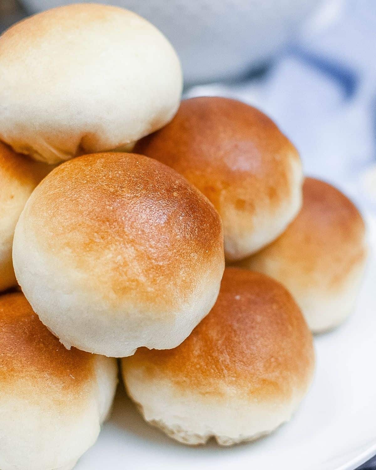 Easy yeast rolls freshly baked on a plate.