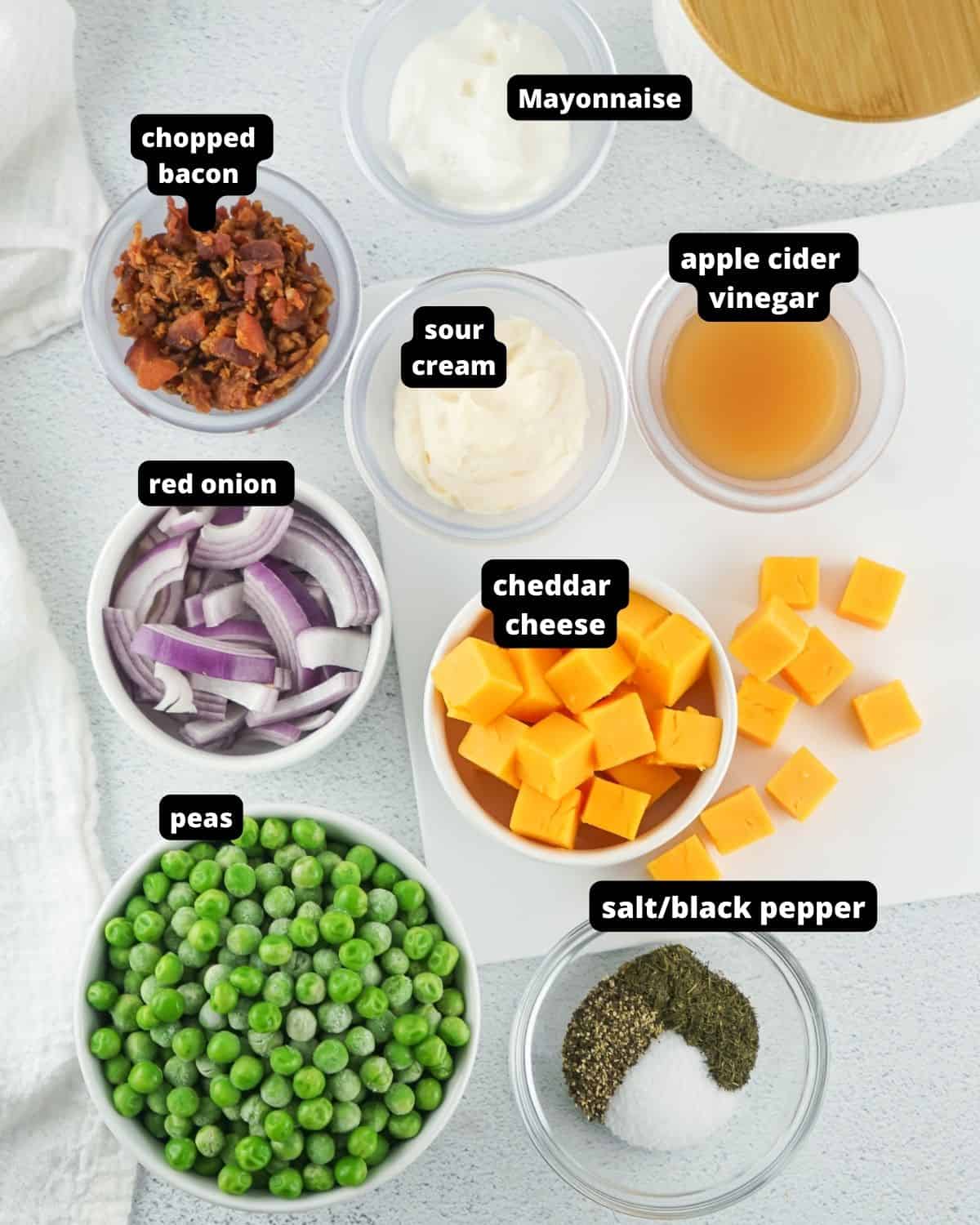 Ingredients to make Pea salad with bacon with text overlay. 