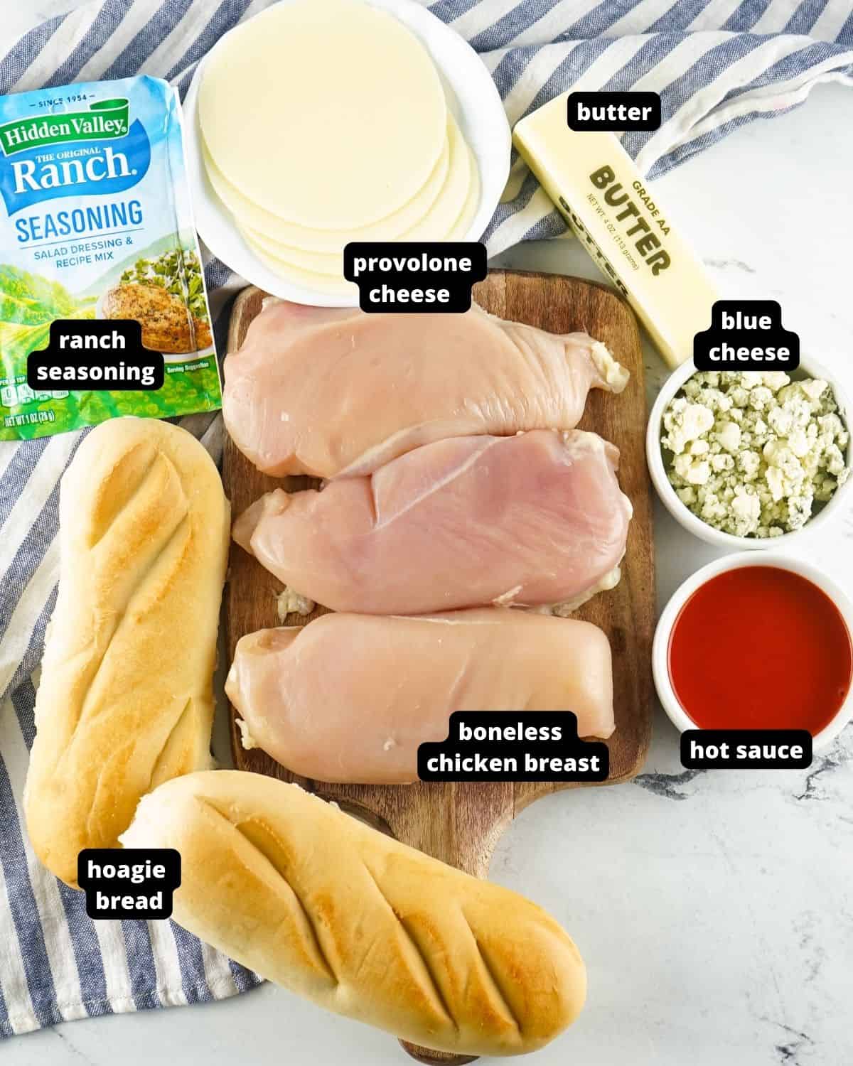 Ingredients to make slow cooker buffalo chicken shredded sandwiches. 