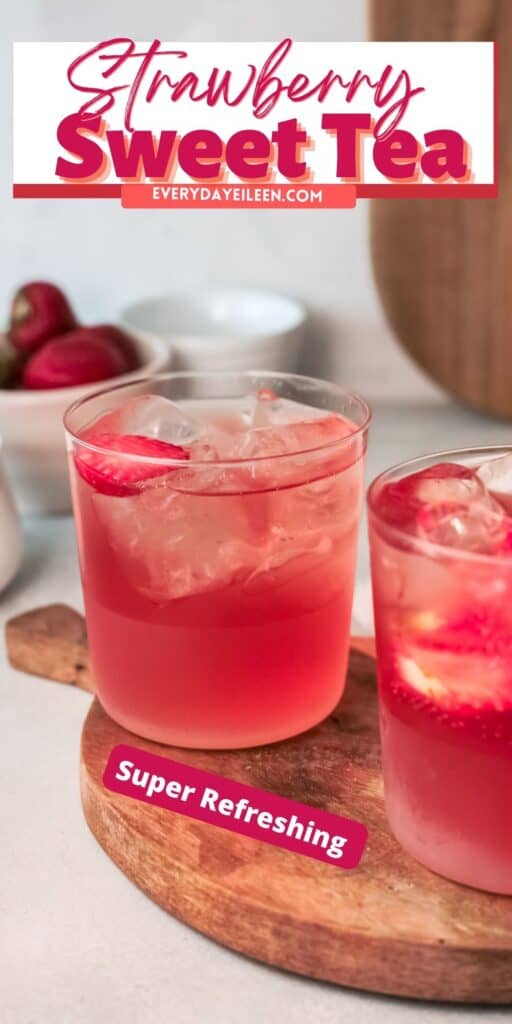 A pinterest pin with text overlay of strawberry iced tea in a glass on a wooden board.