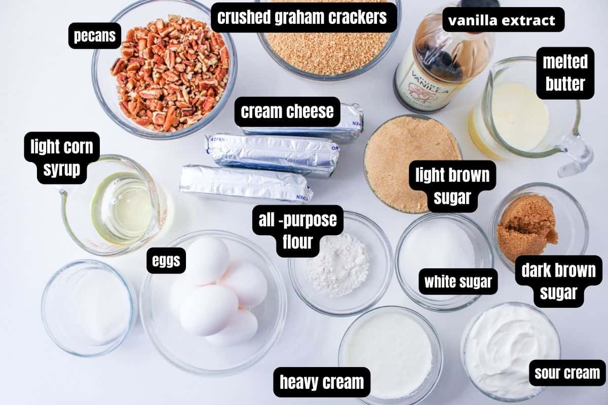 Ingredients with text overlay to make pecan pie cheesecake bars.