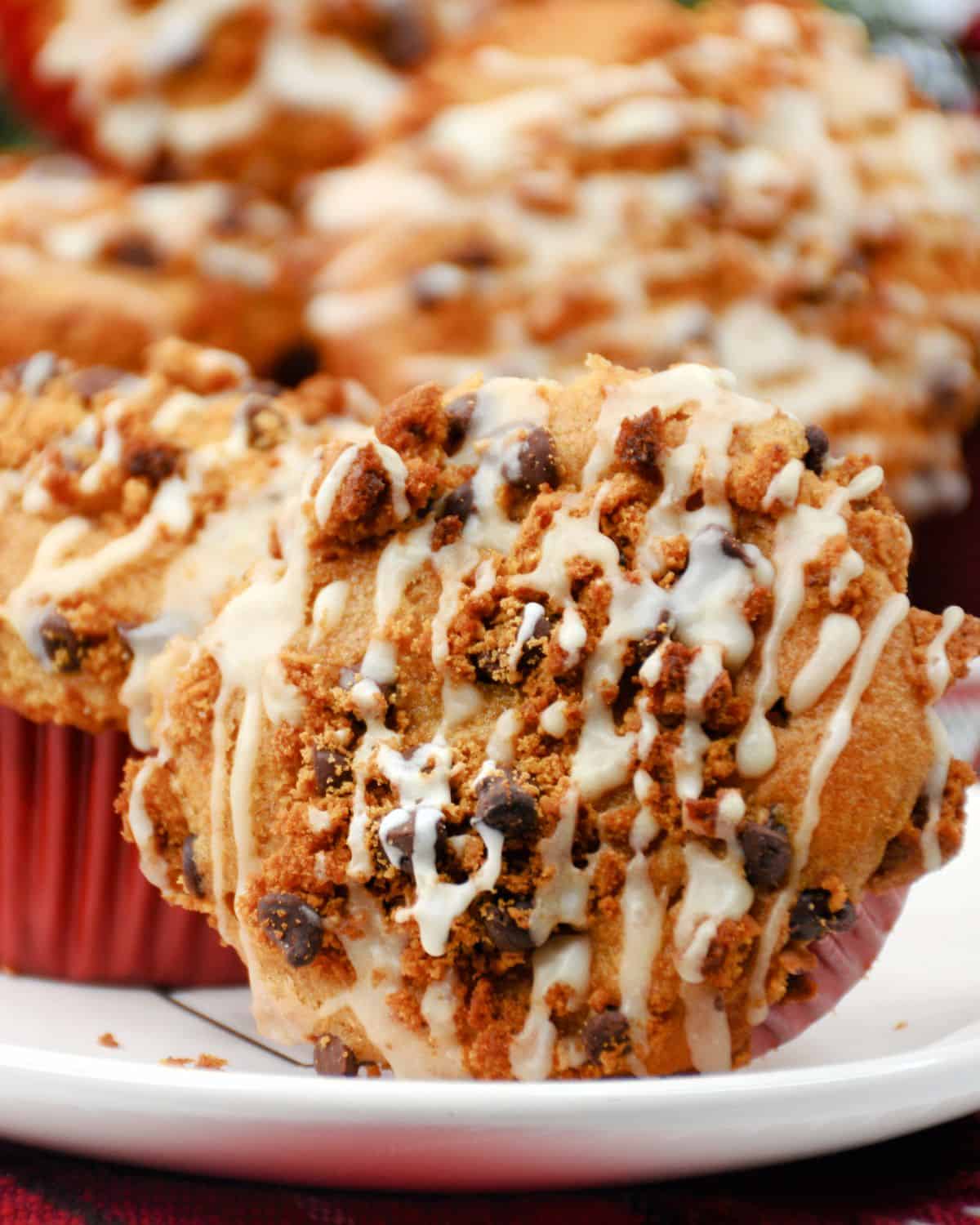 Vanilla glazed gingerbread muffin on its side. 