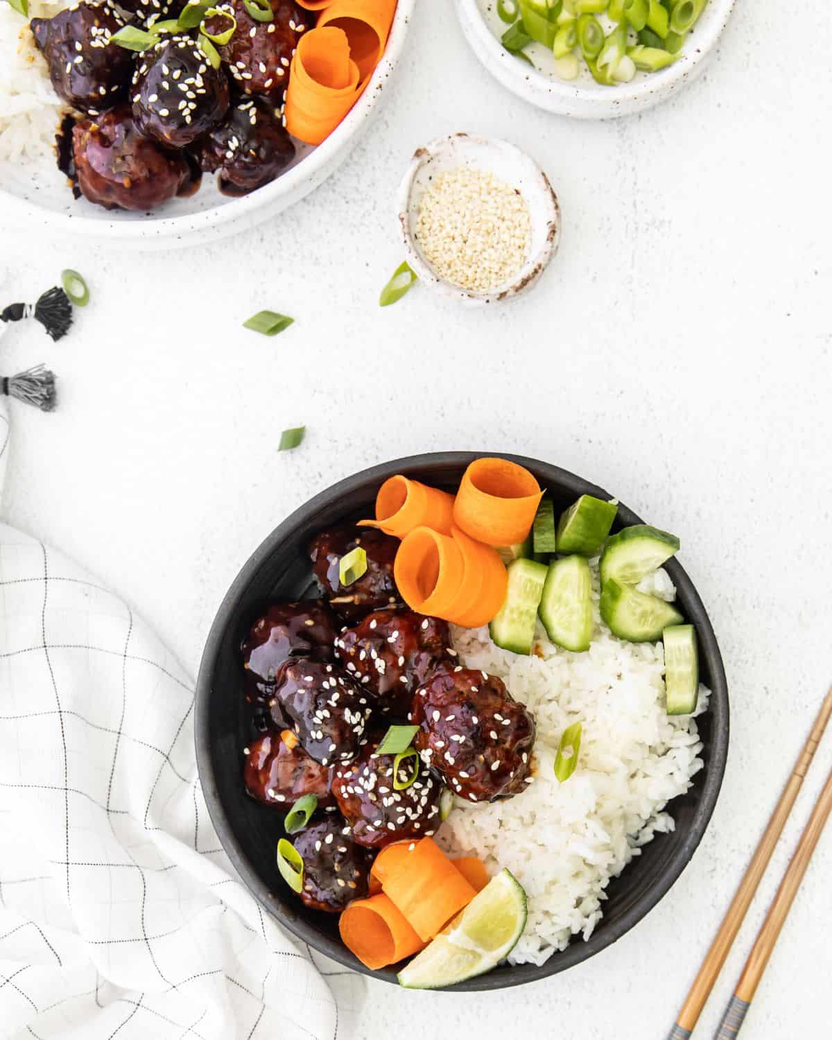 Asian style meatballs with rice and vegetables. 