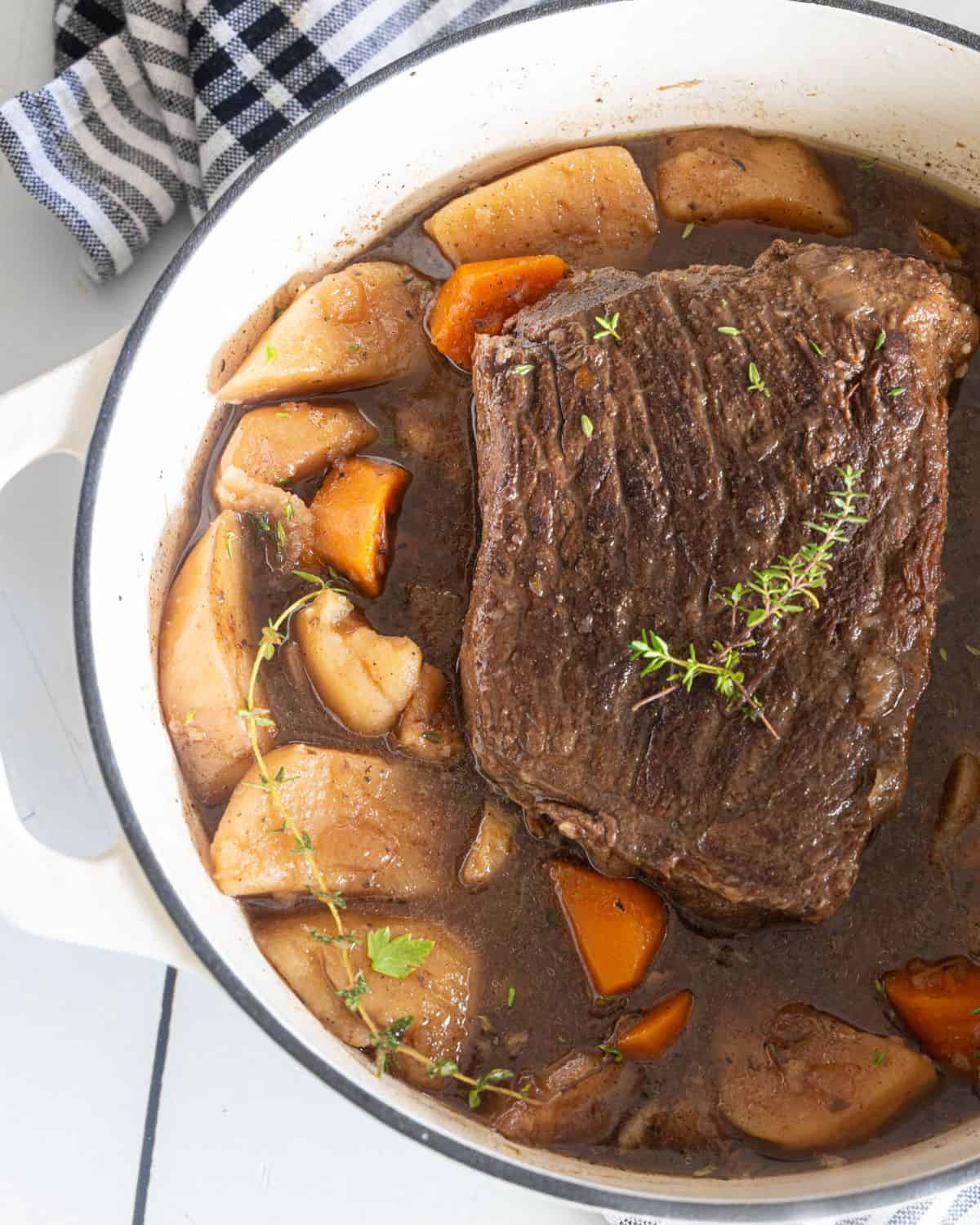 Pot roast, potatoes, carrots braised in red wine.