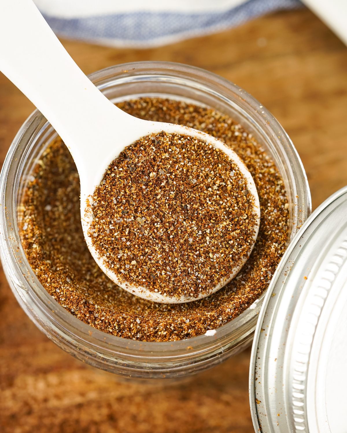 A homemade chili seasoning in a mason jar.