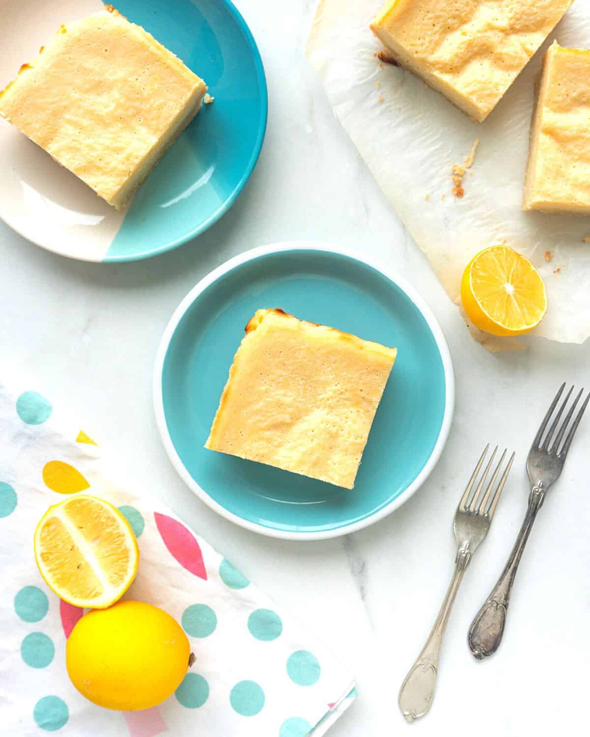 An overhead view of low-carb lemon bars on a white plate.