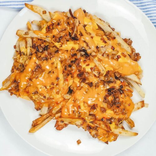 Cheese covered fries made in the air fryer.