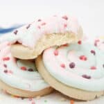 Cotton candy cookies stacked up.