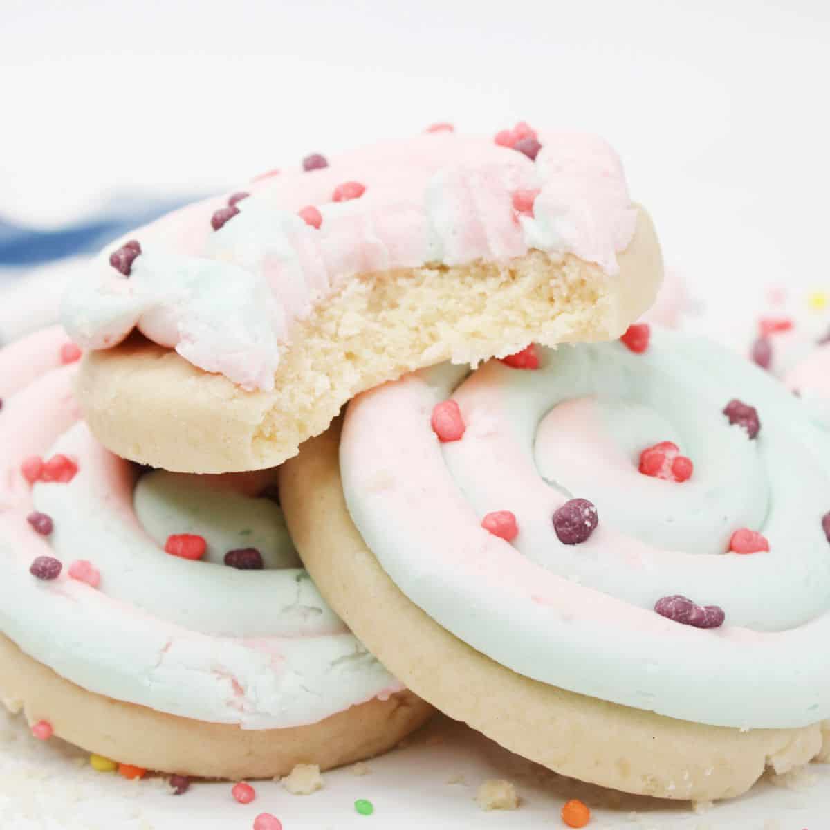 Cotton candy cookies stacked up.