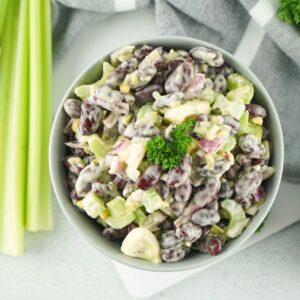 A bowl of creamy bean salad.