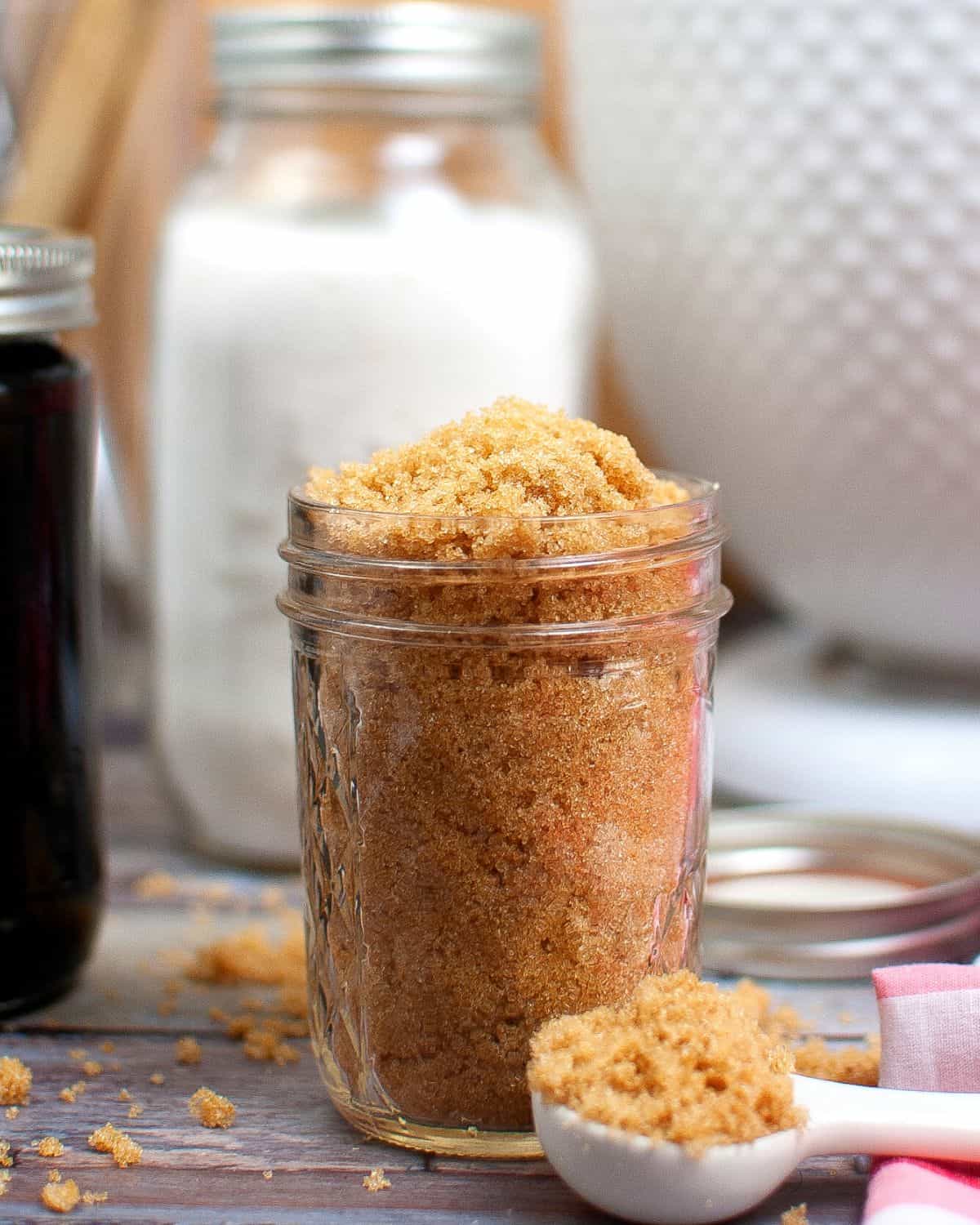 A mason jar filled with homemade brown sugar. 