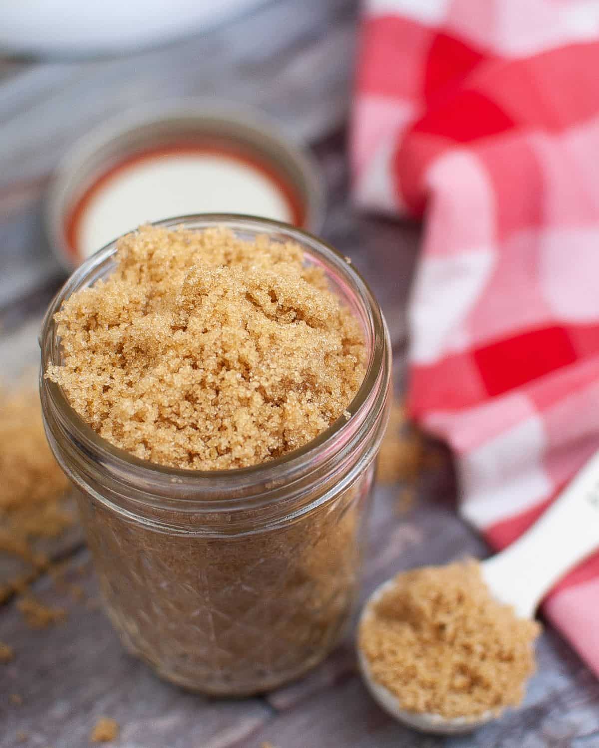 A mason jar filled with homemade light brown sugar.