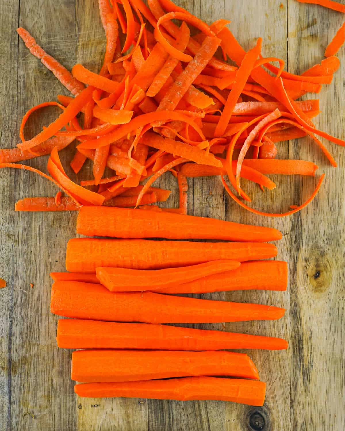 Peeled carrots to make air fryer carrots.
