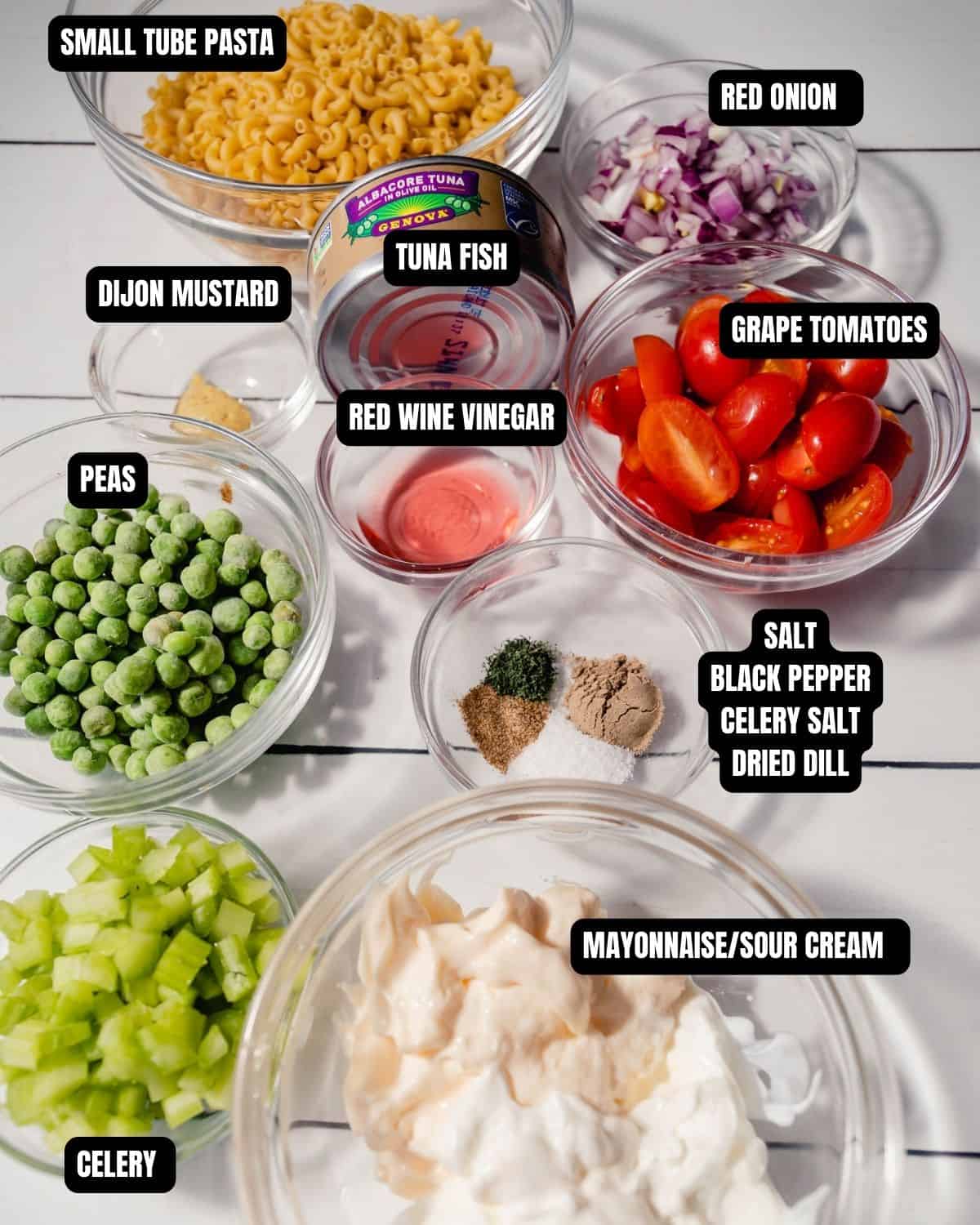 Ingredients with text overlay of what is needed to make an easy Tuna pasta salad.